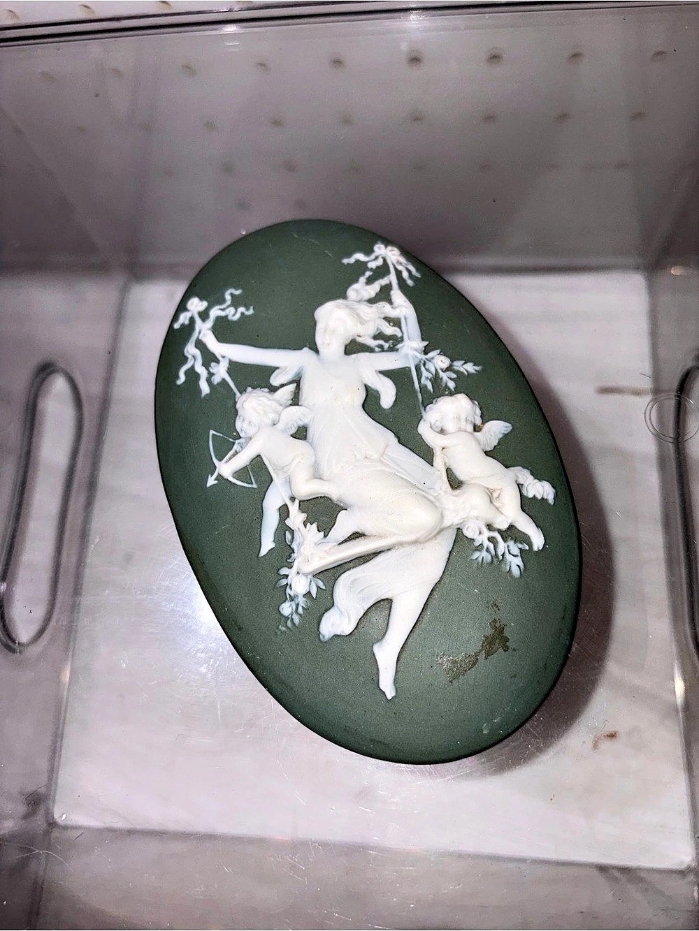 vintage green Jasperware-style oval wall plaque featuring a classical white bas-